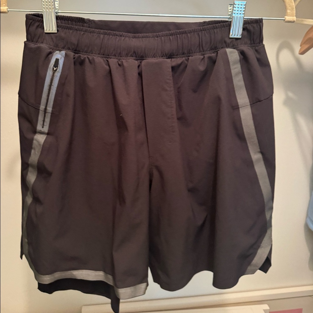 Men’s Lululemon athletic shorts with built-in liner. Size small. Black.